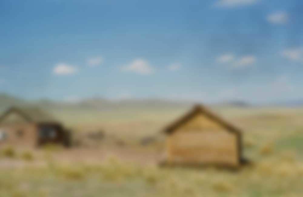 Log cabins on the steppe.