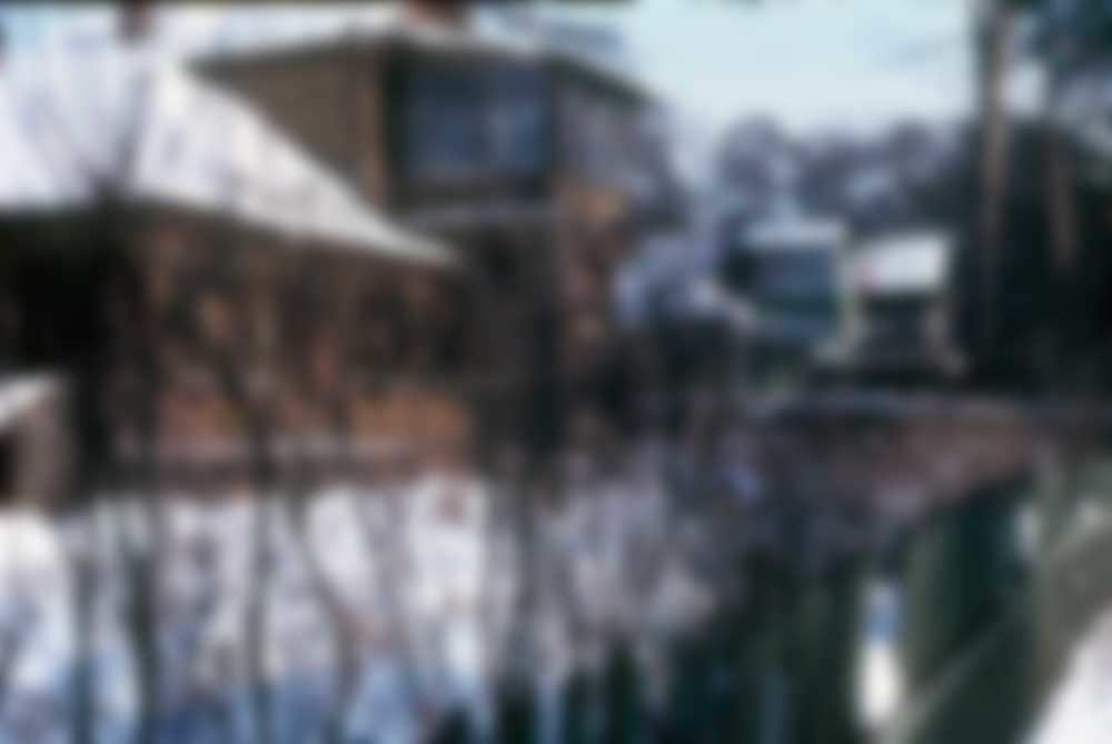Country houses at an unknown location.
